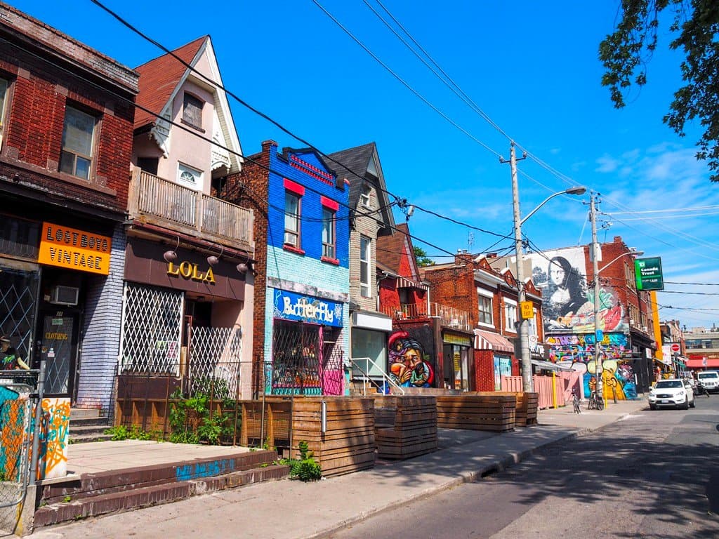 Kensington Market in Toronto is one of the mos hip places in the city. Take your time to stroll through the small streets to admire the striking architecture and browse the small independent stores.
