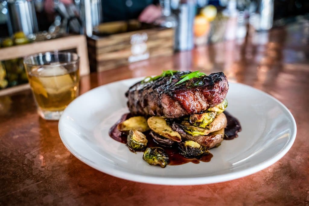 Colorado strip steak, roasted fingerlings, braised brussels, cabernet demi glace