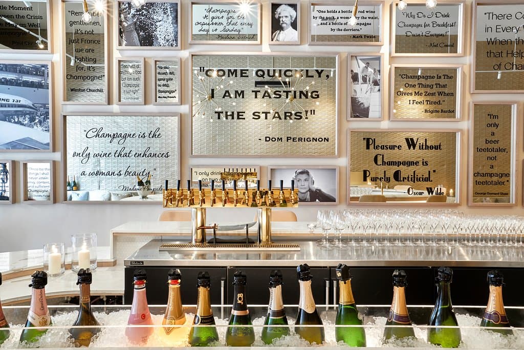 Come sit at the bar and have a glass with us!