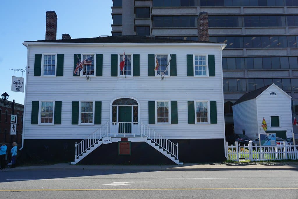 The view of the home, looking across Union Street. When built the front door was at ground level.  The carriage house is to the right.