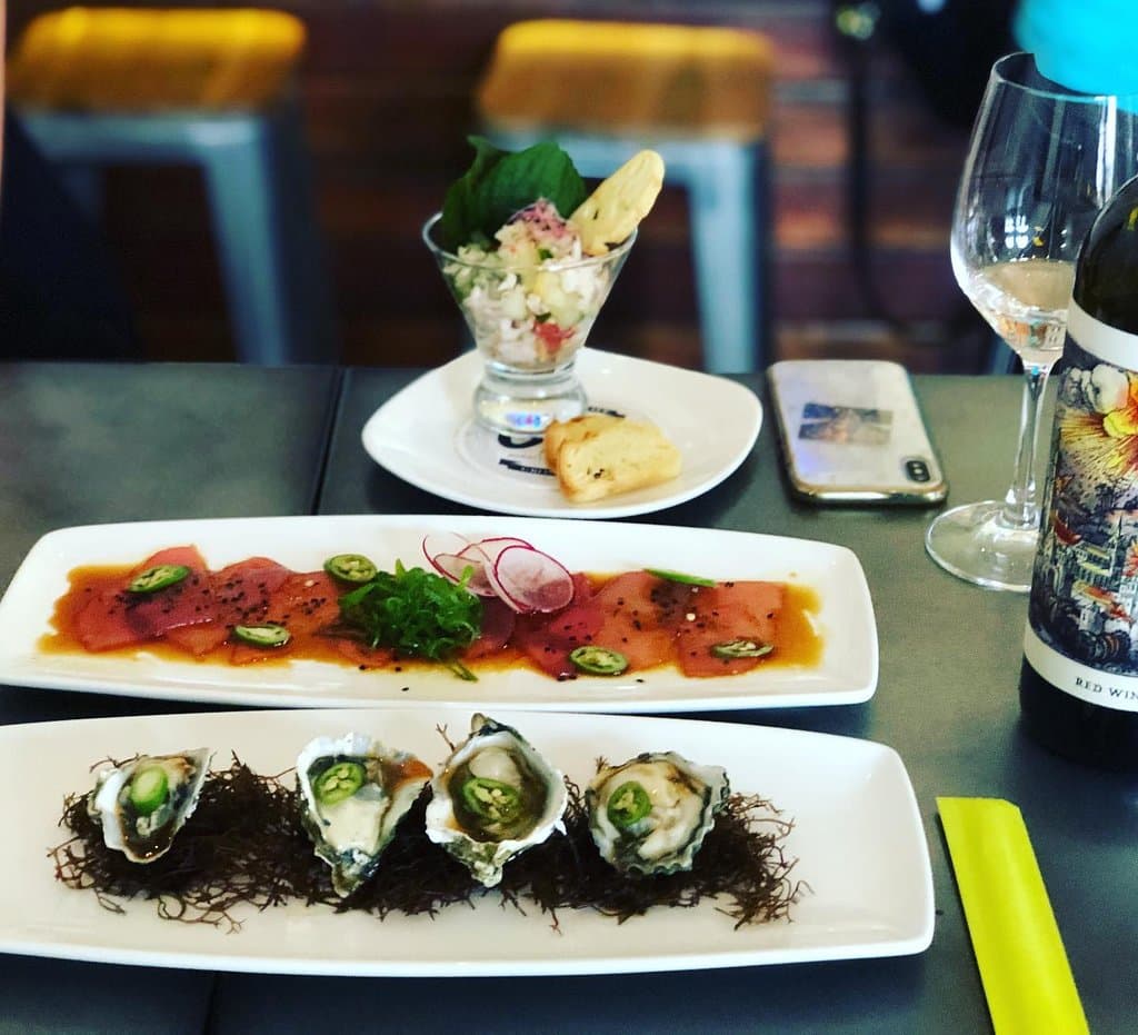 Kumomoto Oysters, Ahi Carpachio and Kauai Prawn Ceviche