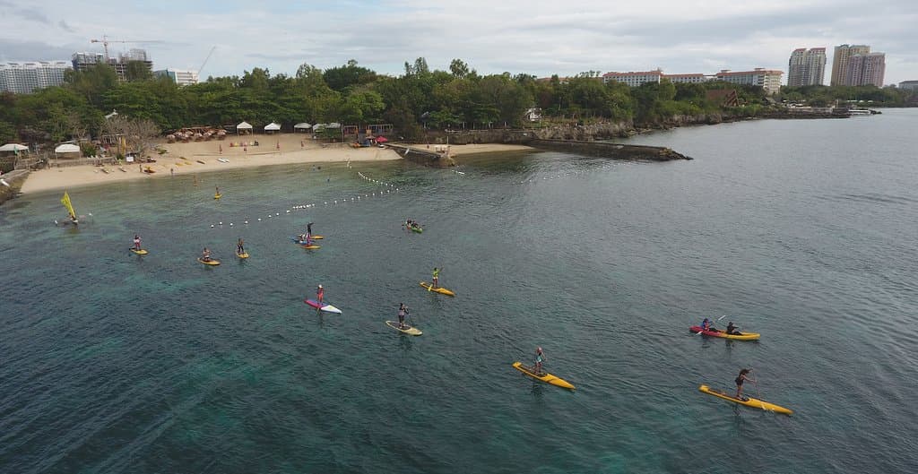Stand Up paddlers at Mactan New Town beach.