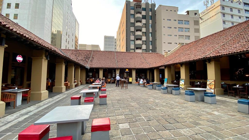 The courtyard with the shops all around