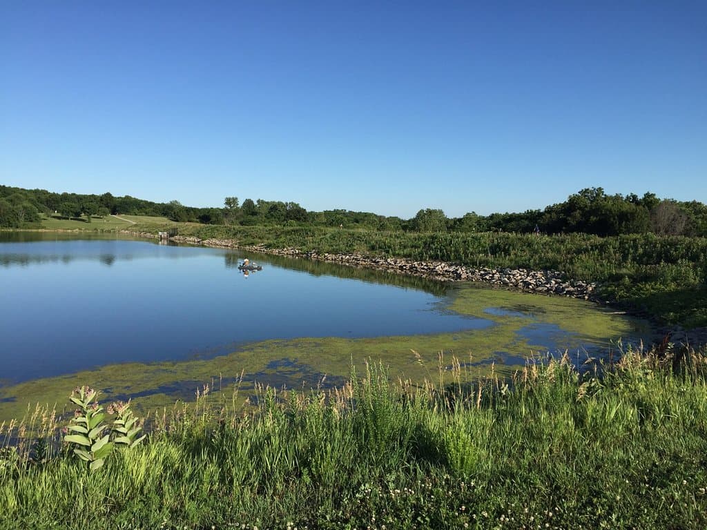 View of lake under blue sky