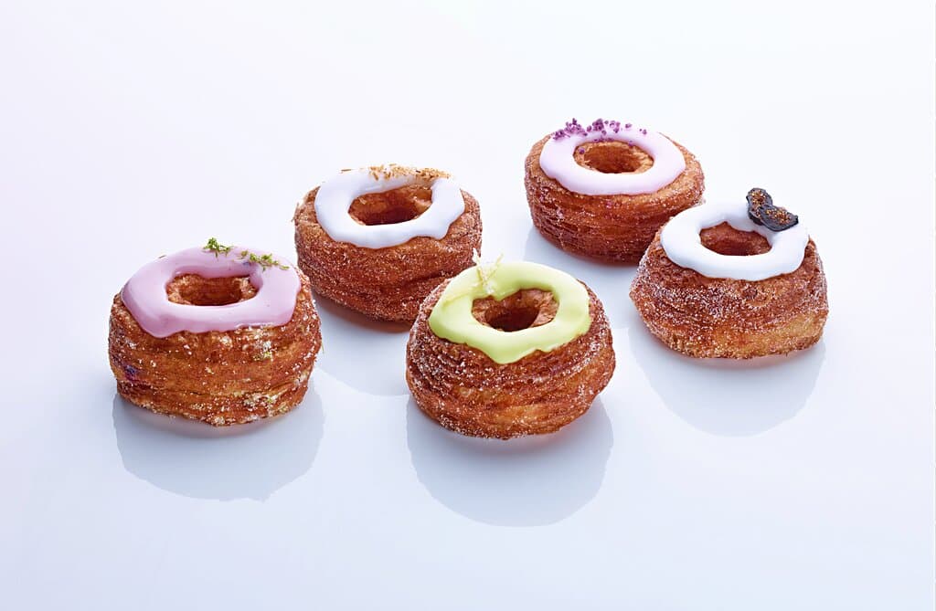 The Cronut® - Chef Dominique's signature half-croissant, half-doughnut pastry. First launched here in our NYC Bakery in May 2013, we make a different flavor every month, never repeating. 