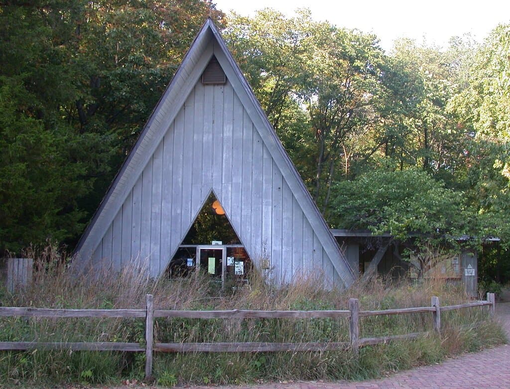 Forest Park Nature Center's characteristic A-Frame building, housing museum, store, and indoor restrooms. 