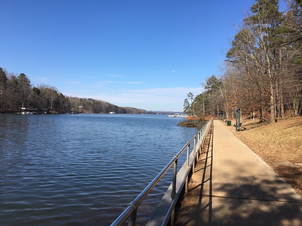 The Carlyle Cox Lake Walk runs along the shores of Lake Lanier. There are swings & park benches along the way where you can sit, relax & enjoy the lake views