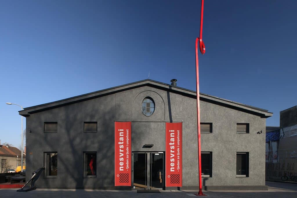 Frontal facade of the building and the main entrance.