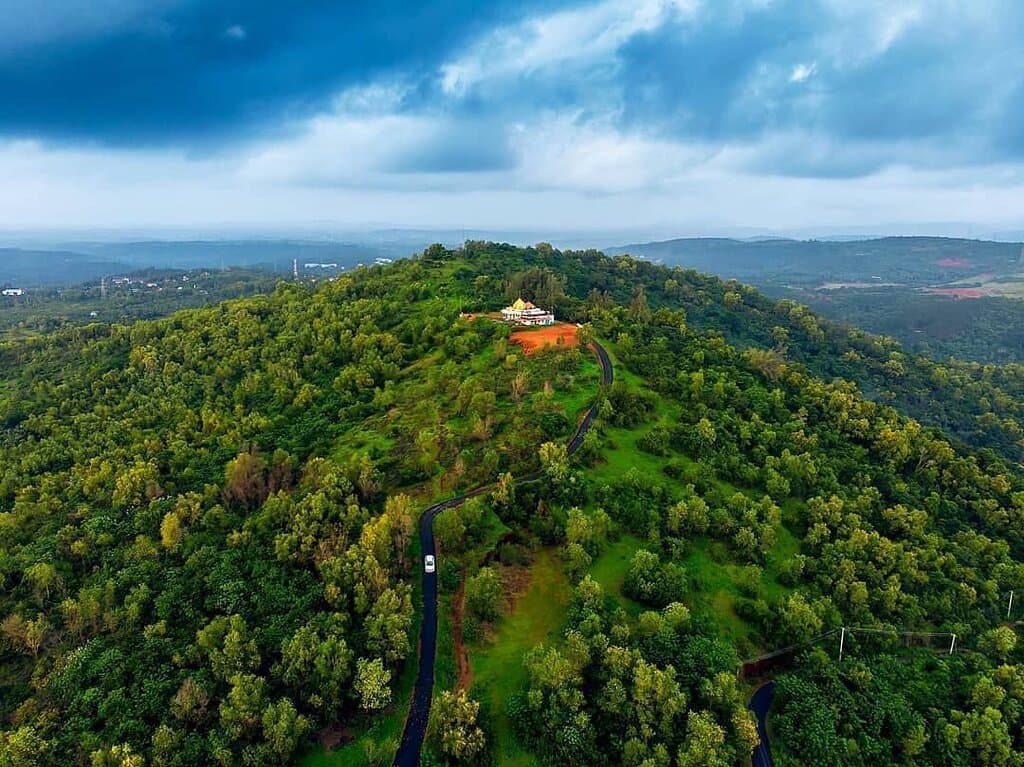 A beautiful hill giving panoramic views and a colorful sky in the evening. One of the less explored places in the area, best visited in the evening.