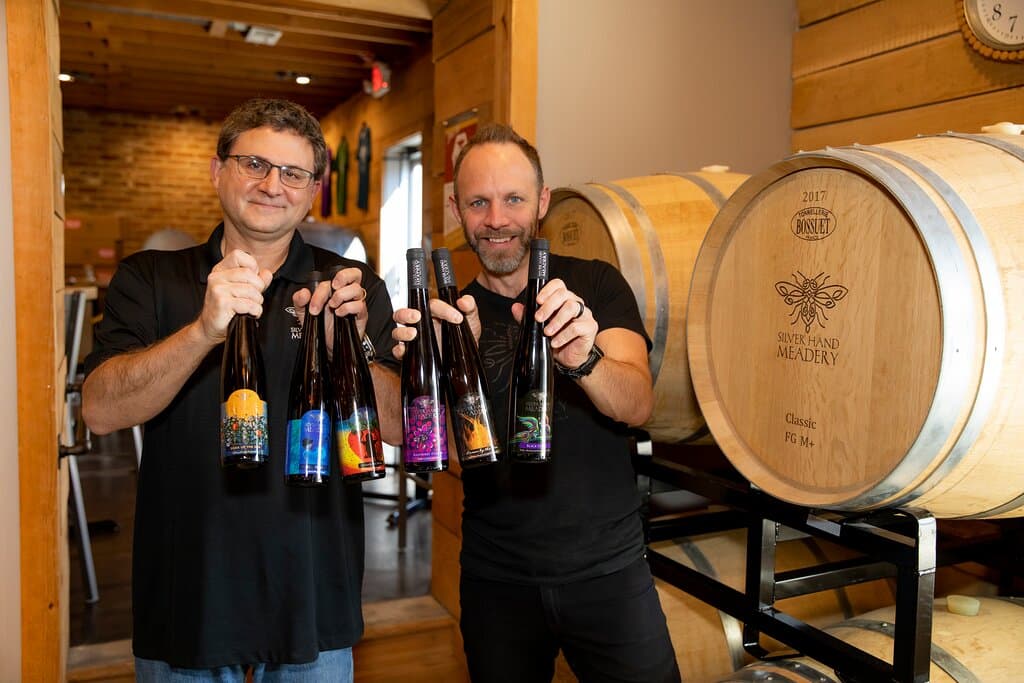 Meadmaker Sam Straight and owner Glenn Lavender with their 2021 Governor's Cup Gold Medal winners.