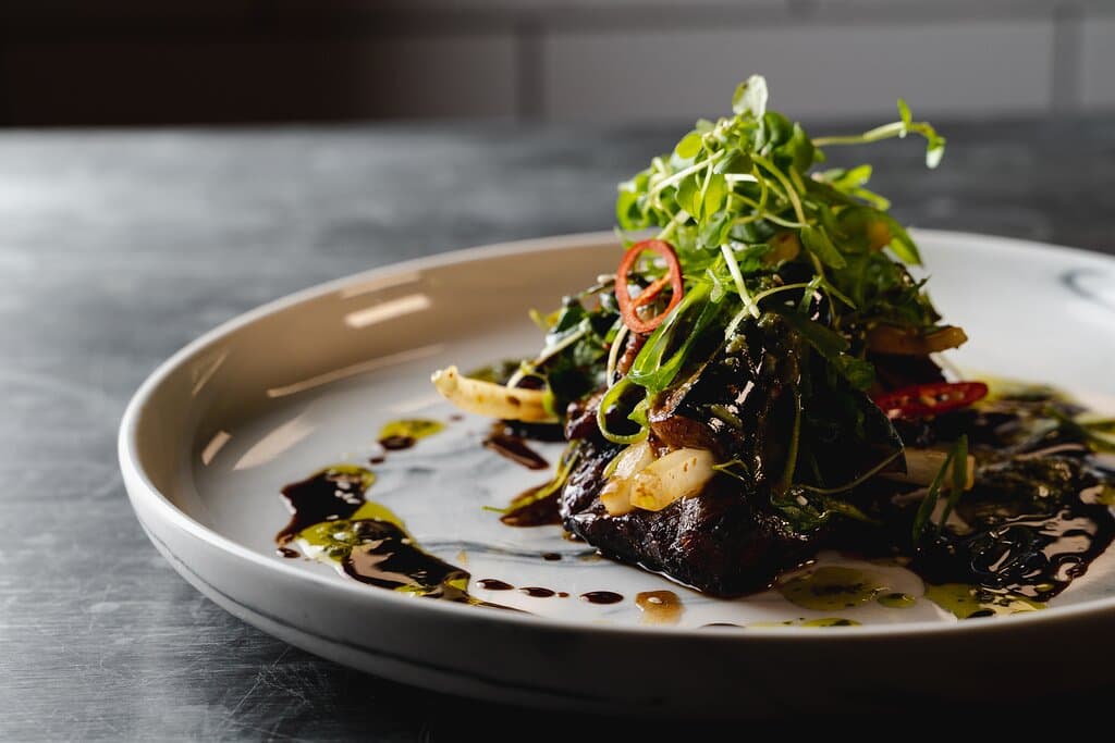 Chargrilled Steak 

Silver Fern Farms Soy Glazed Beef, Salsa Verde Pesto, Marinated Eggplant & Daikon Salad