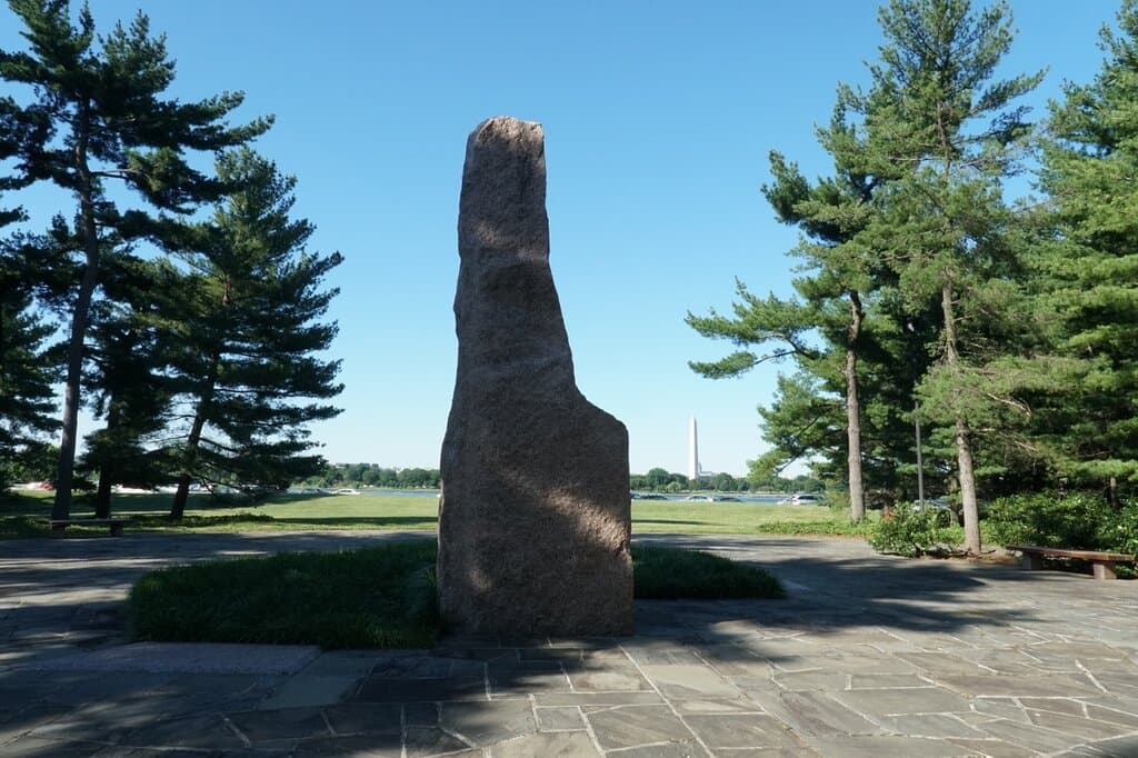 The Stone Monolith at the Lyndon Baines Johnson Memorial Grove, with the Washington Monument.
