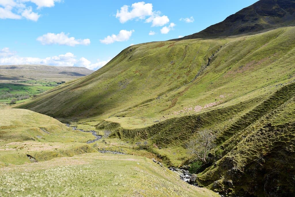 Visited on Wednesday 19th May 2021 We drove back to Sedbergh and stopped off at the Cross Keys Temperance Inn on the A683 and I walked to the nearby Cautley Spout Waterfall. Parking at the layby was tight as there is only space for a few cars, but you have a sign straight away directing you towards the path that leads to the spout. The walk to the base of the spout from the road is circa 2km and though listed as only a 9m elevation change it felt a lot more 