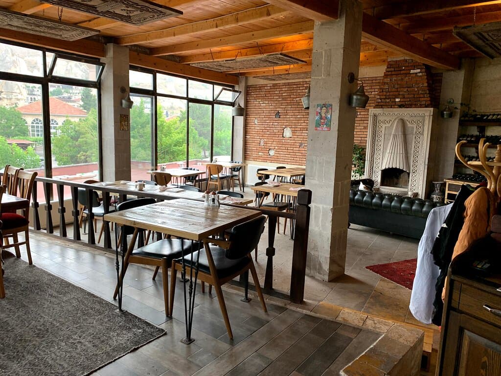 The beautiful restaurant with floor to ceiling windows