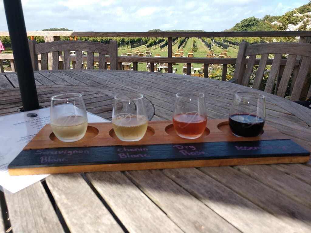 Great presentation of the Paumonok Flight on their deck overlooking the vineyard.