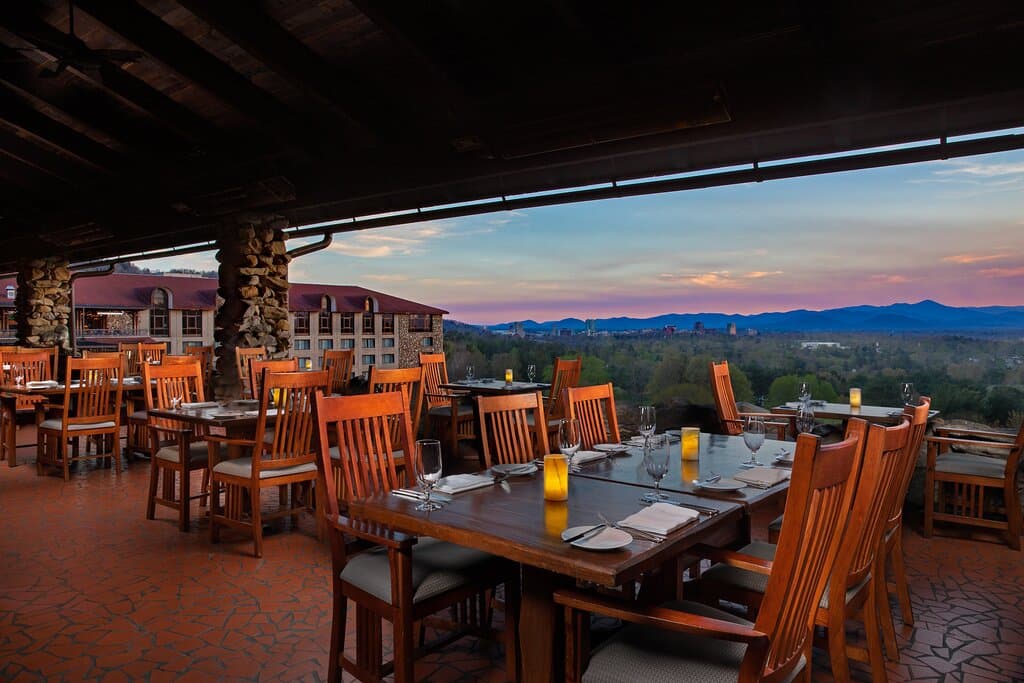 Photo of the Sunset Terrace and view of the Blue Ridge Mountains and Downtown Asheville.