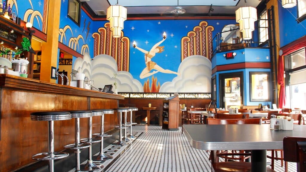 Art deco murals adorn the walls at The Fountain on Locust.