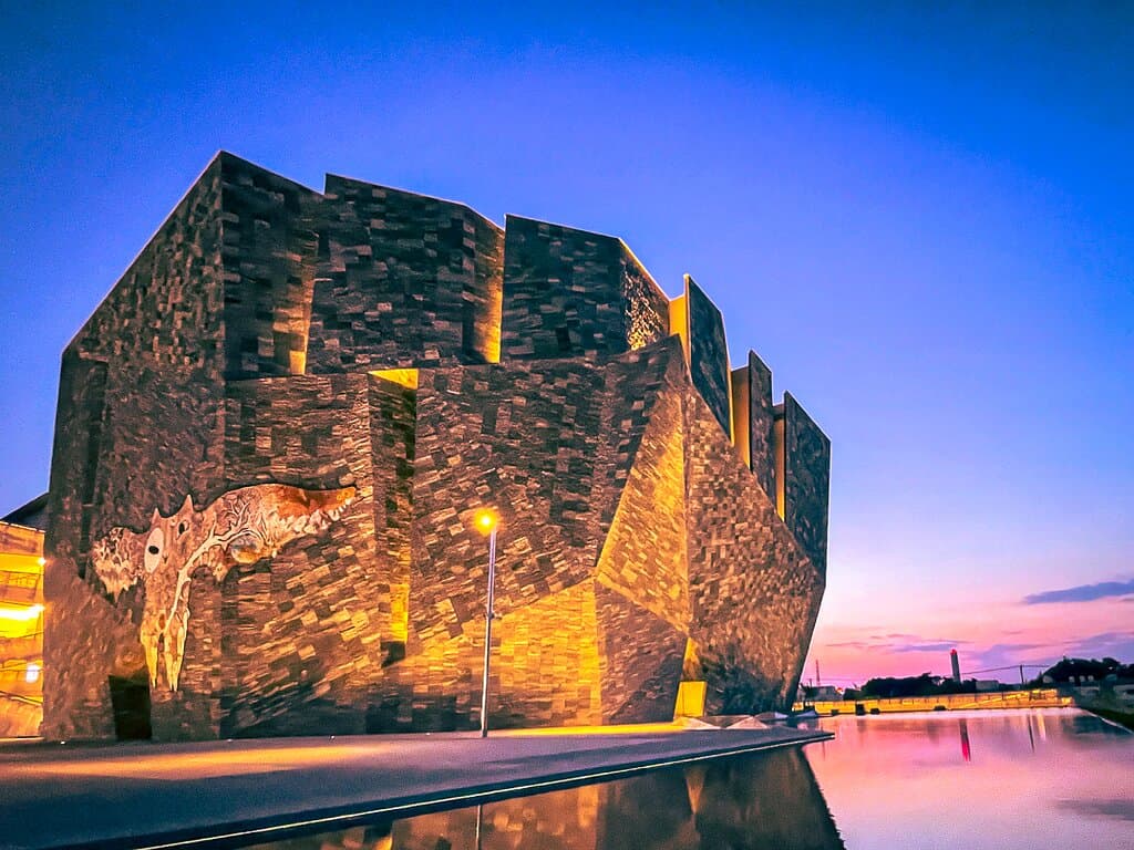 There are no skyscrapers around the area, meaning you too can snap a great sunset like this.

In the foreground is Kadokawa Culture Museum (KCM) and inside is where you find the famous Bookshelf Theater.