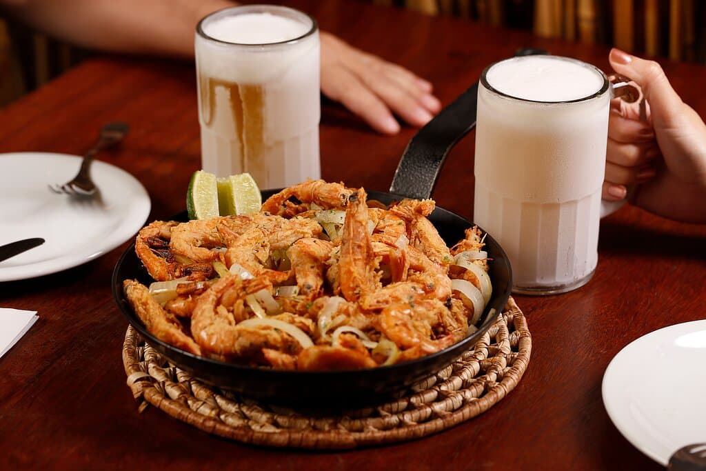 Chopes e petisco: Praia do Paraíso