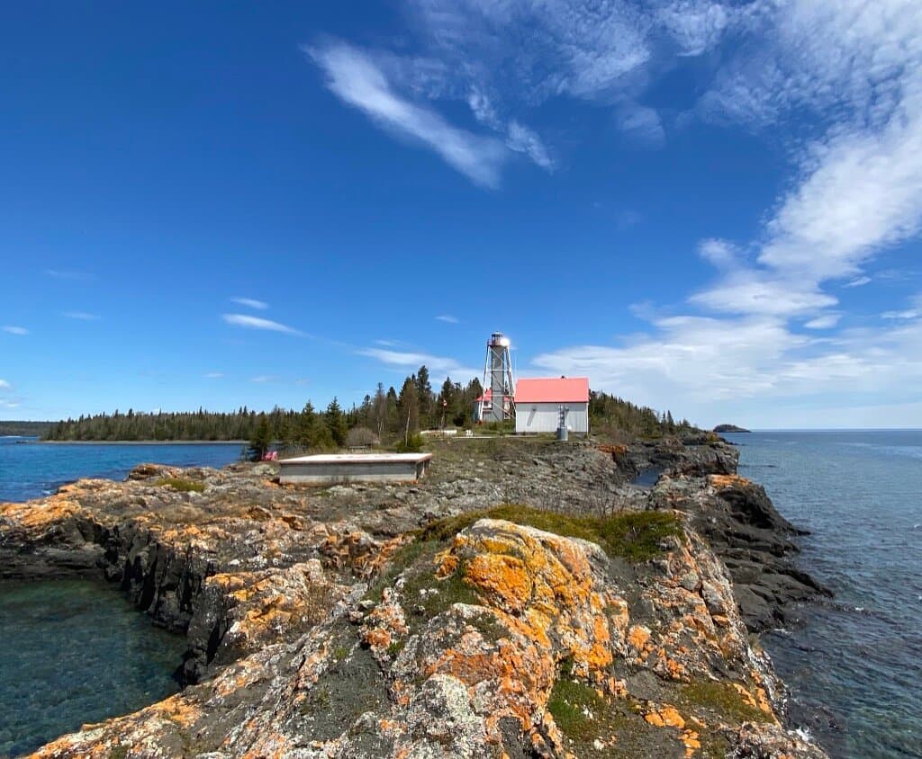 Taken from Porphyry Point,  showing the Lighthouse tower and former foghorn building that has been converted into a museum and art gallery. 