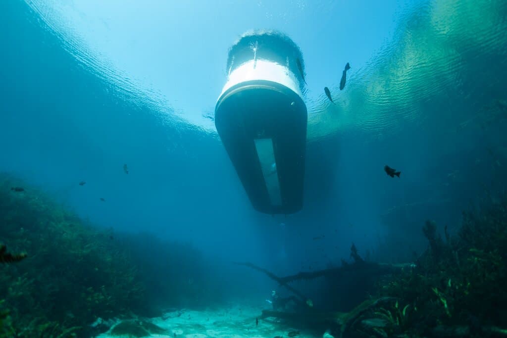 Underwater view of a glass-bottom boat 