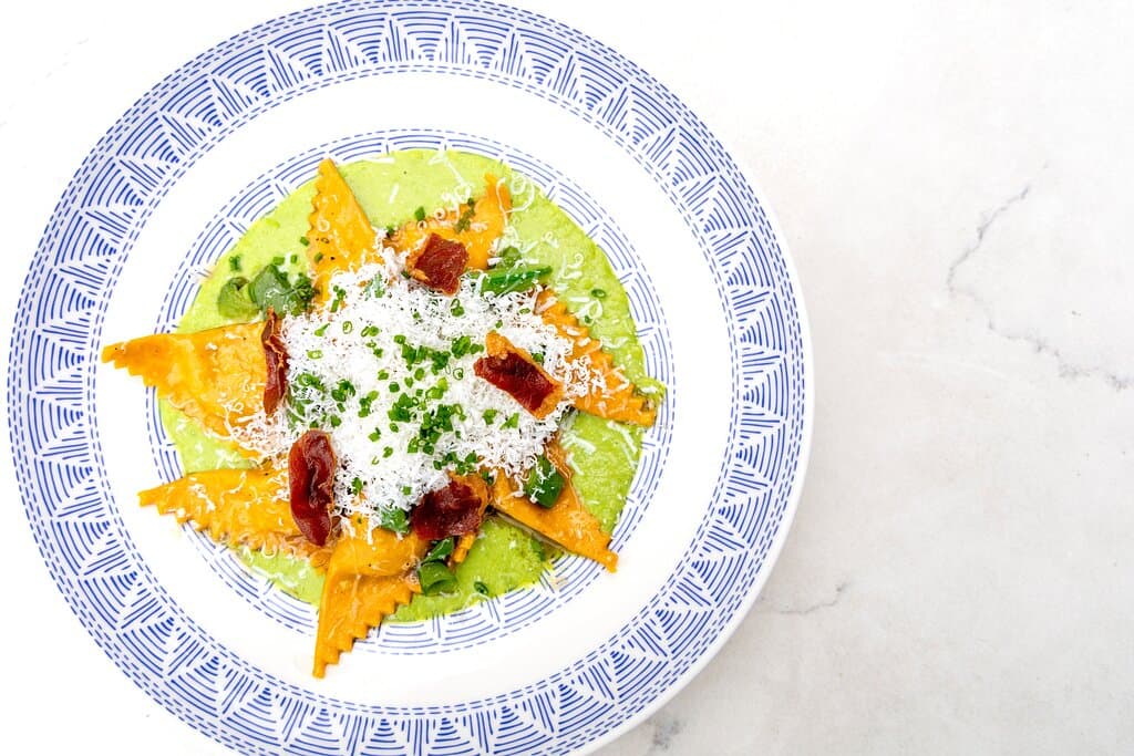 Featuring house made pastas, carefully curated wines, and a balance of cherished family recipes with fresh, vibrant flavors.