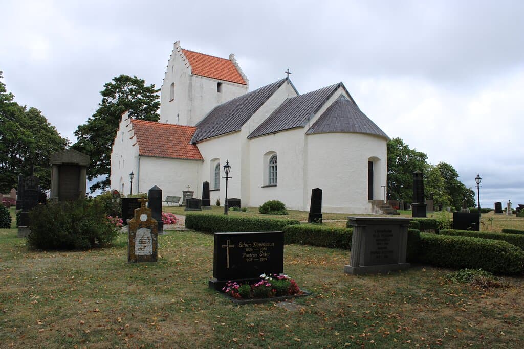 Exterior view of the church showing part of the graveyard.