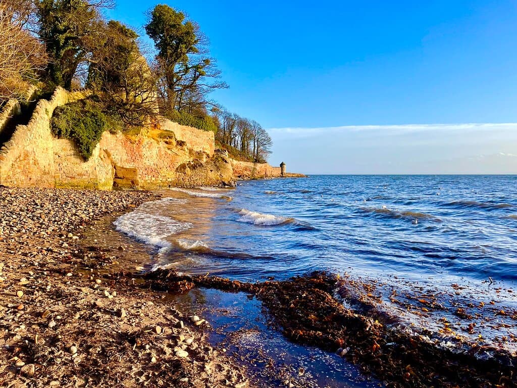 The beach down from the park is scattered with sea glass, flint and semi-precious stones.