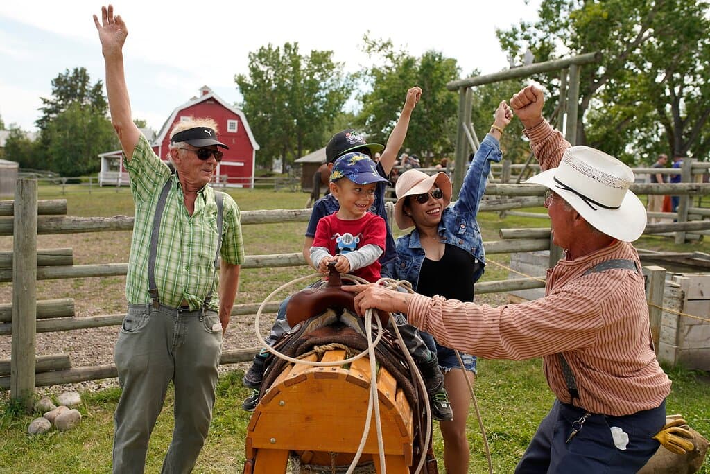 Guests having fun in the Ranch area of the Historical Village.