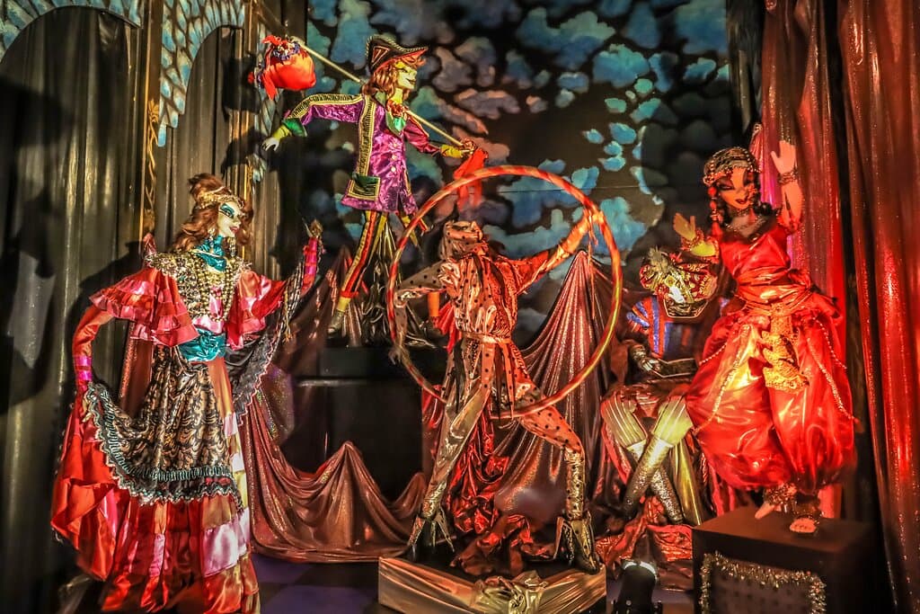  Private family collection of full-size life-like dolls in shimmering gowns and elaborate background sets. The Lighting is brilliant!