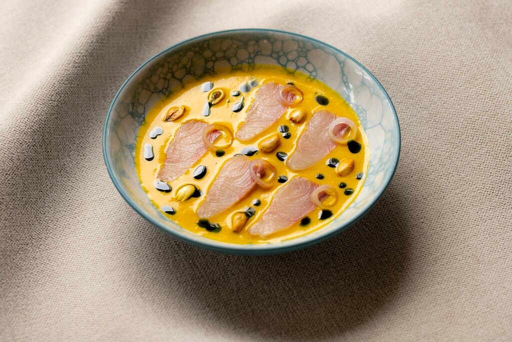 Tiradito with hamachi and smoked amarillo leche de tigre