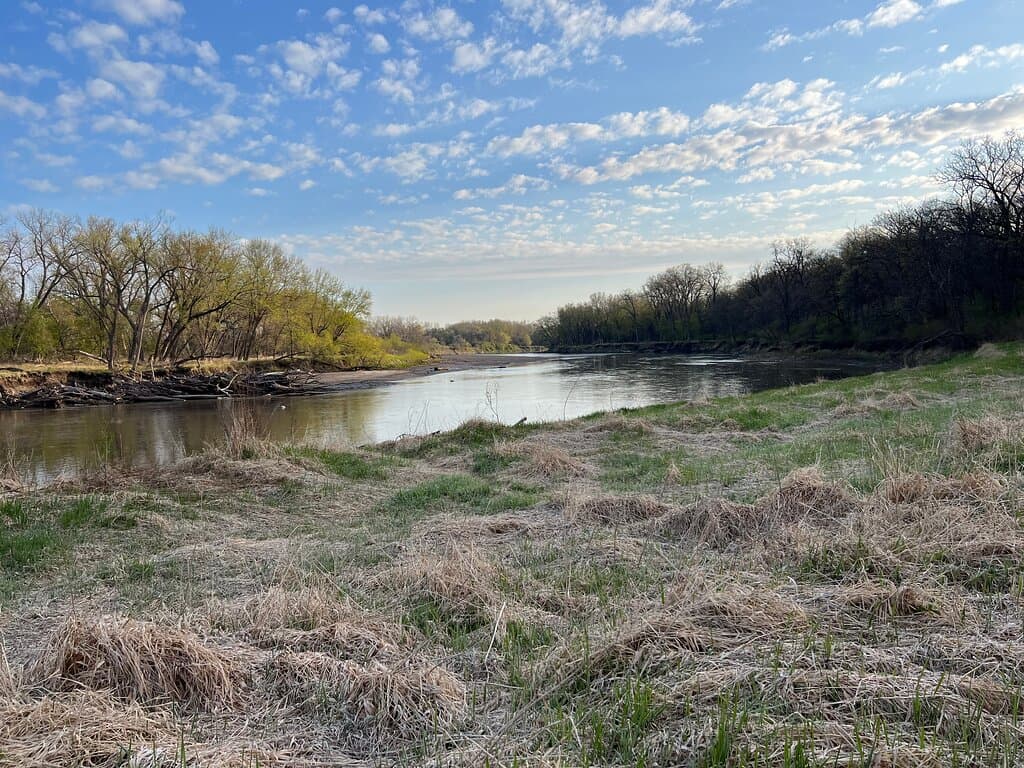Standing on the banks of the Raccoon River