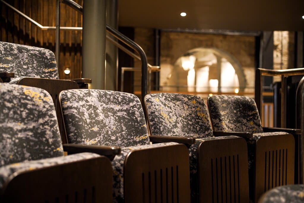 Seating in the Cornwall Playhouse. Designed to replicate Cornish granite.

Photography by Hugh Hastings.