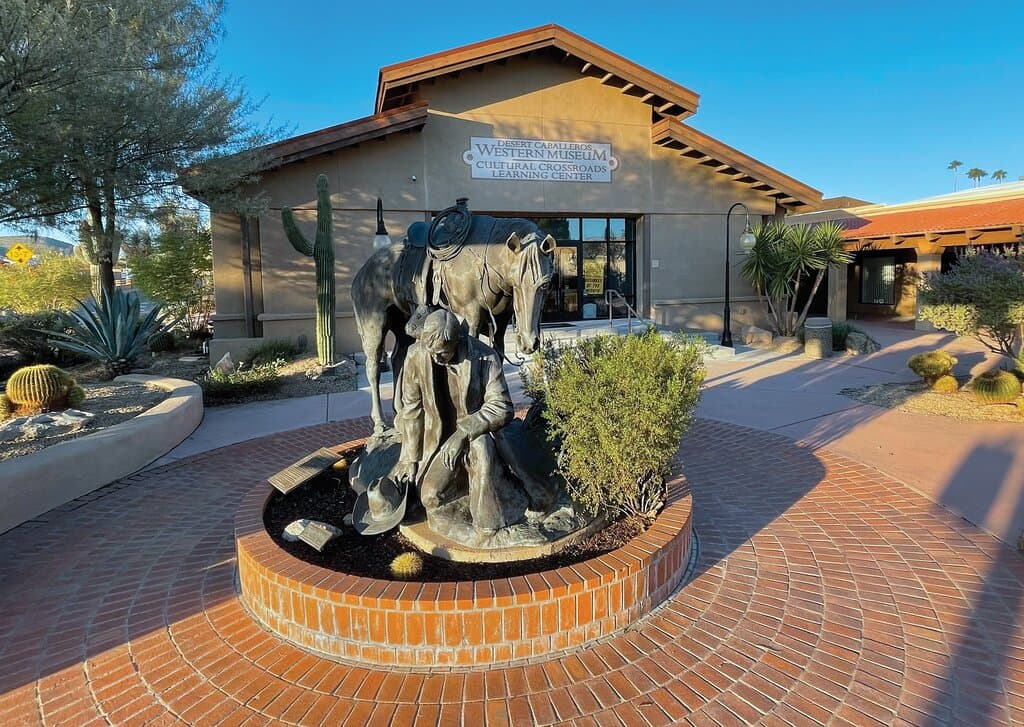 Desert Caballeros Western Museum campus in the heart of Wickenburg, Arizona featuring a sculpture by Joe Beeler (CA) titled "Thanks for the Rain".