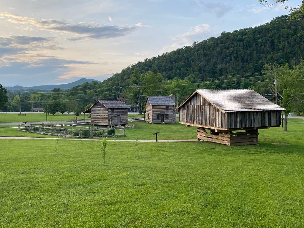 Our 1830s farmstead includes the Anderson Log House (1802), the Davis Log House (c. 1830), a single-pen cantilever barn (c. 1830s), and an heirloom kitchen garden.