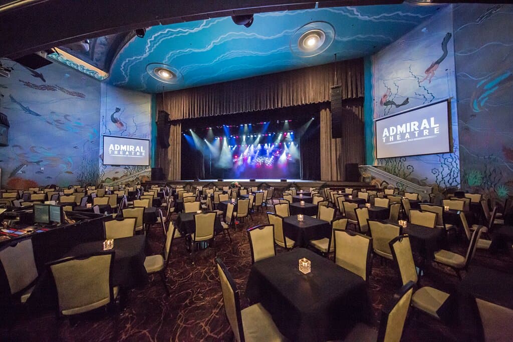 Admiral Theatre main floor seating for 320 at 4-top cabaret style tables