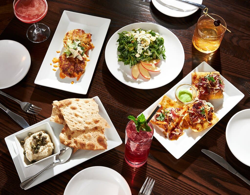 Seared Tuna, Crabcakes with Old Bay mayo, MI Apple & Manchego salad with festive craft cocktails