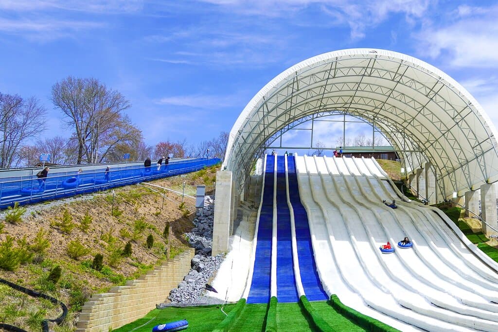 Blizzard Ridge boasts 11 lanes, 3 for Summer Tubing and 8 for Snow Tubing. Tube down over 500' with a 70' drop on the largest Tubing Hill in Tennessee!