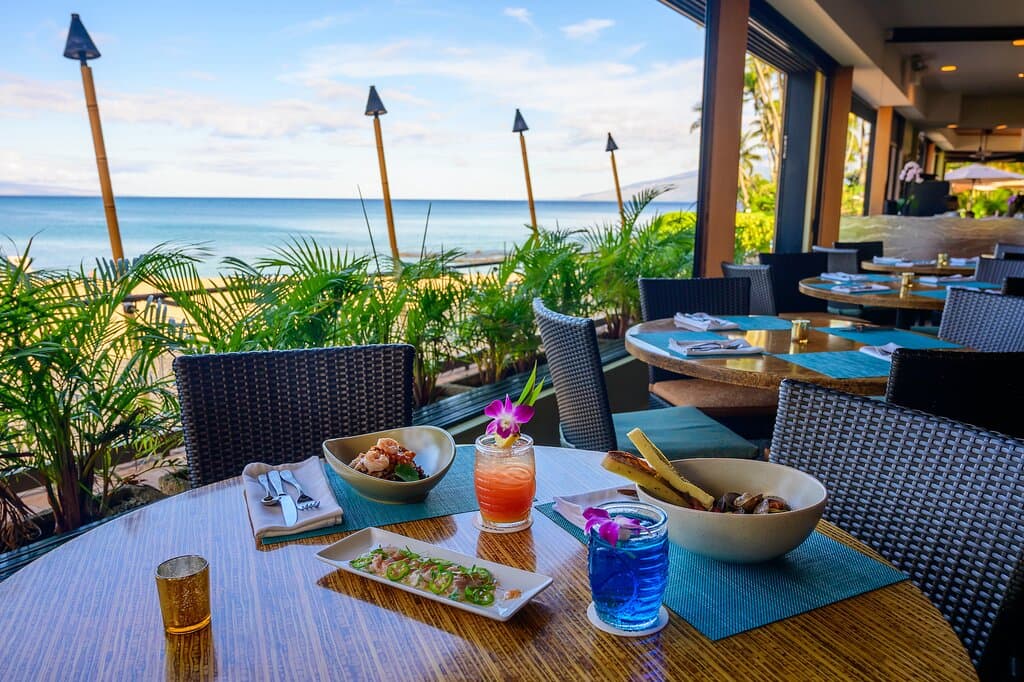 Sea House Restaurant at Napili Kai Beach Resort offers open-air dining and delicious sea-to-table cuisine at its gorgeous oceanfront location.