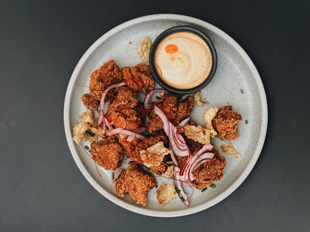 Order small plates for the table to share, or enjoy one of our delicious main dishes.