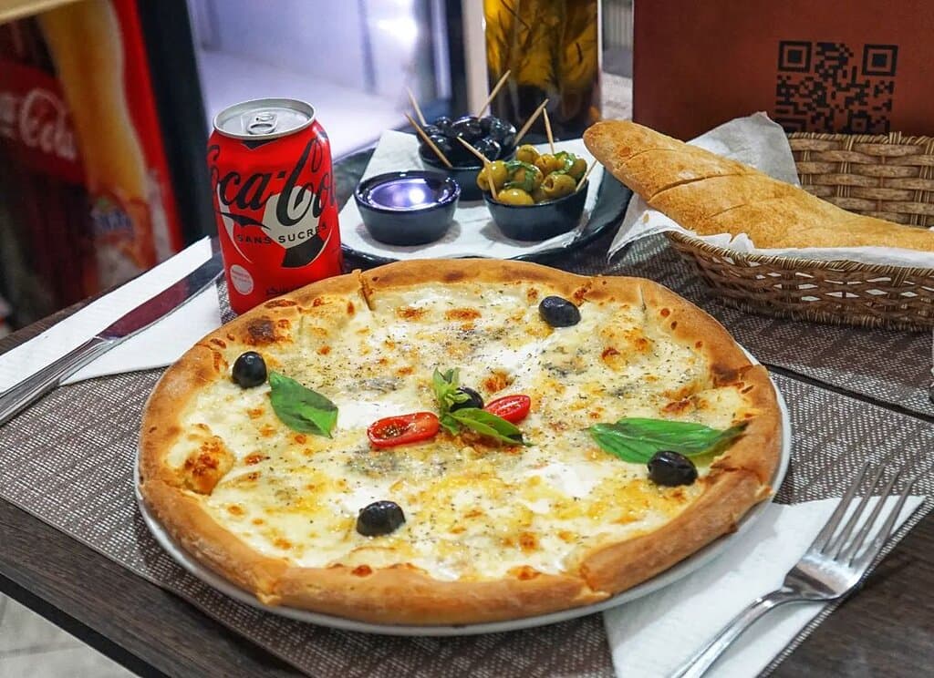 🍕 Indulge in Cheesy Bliss with our 4 Cheese Pizza! 🧀✨
