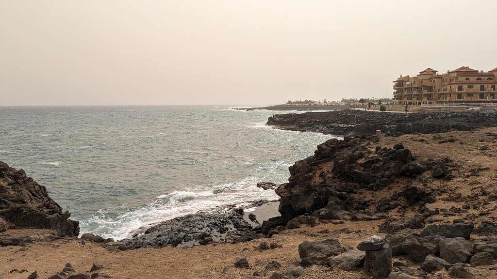 The pools are close to the Castillo San Jorge hotel, which you can see in the distance here.