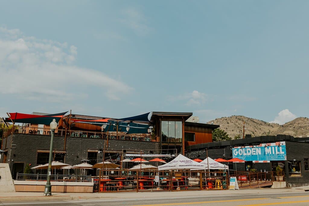 Indoor and outdoor dining space with the only rooftop bar in Golden, CO