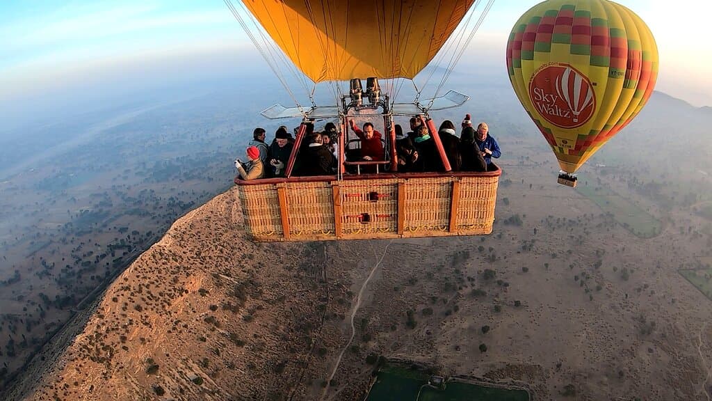 Flying side by side.