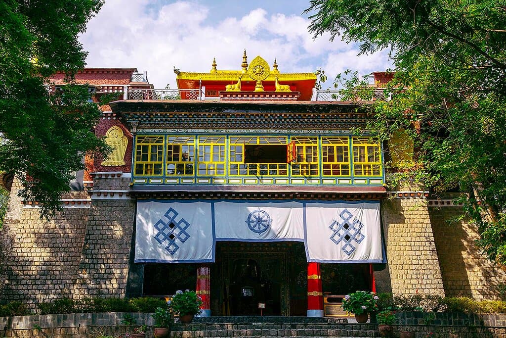 Deden Tsuklagkhang Temple, meaning ‘The seat of happiness’ temple is a magnificent example of Tibetan religious architecture, displaying some of the finest work done by Norbulingka artists, and the perfect place for prayer and reflection. The temple is built in the traditional Tibetan style with a wide base and a narrow top.