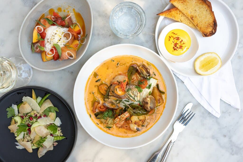 Bouillabaisse & Greens, Pear, Avocado Salad