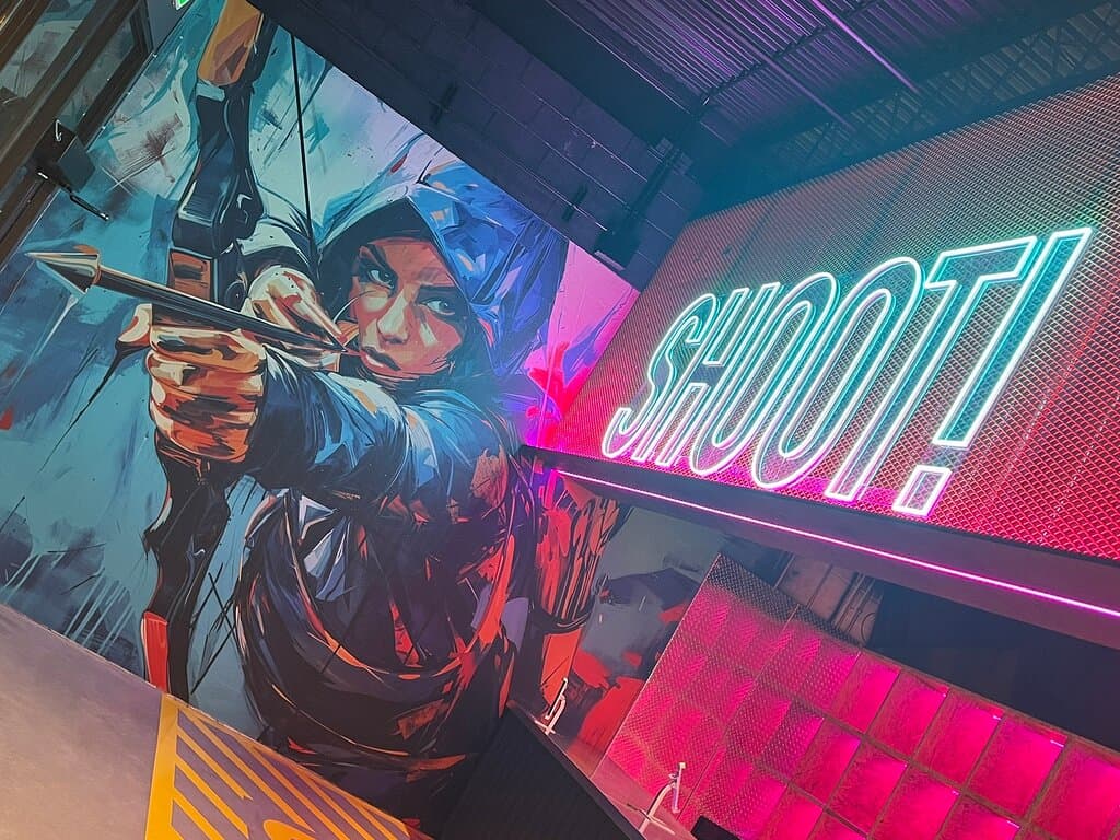 Indoor archery tag and ping pong facility