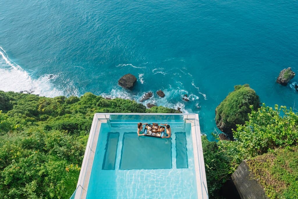 "Experience the height of luxury at oneeighty – where breathtaking clifftop views meet unrivaled indulgence. Soak up the infinity-edge pool, sip on crafted cocktails, and savor every moment in paradise. 