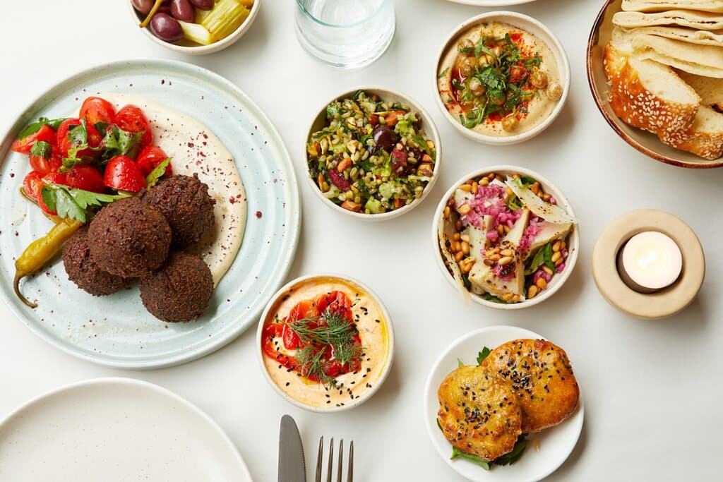 Honey & Co. Middle Eastern Mezze selection. Lots of small sharing plates to start the meal. 