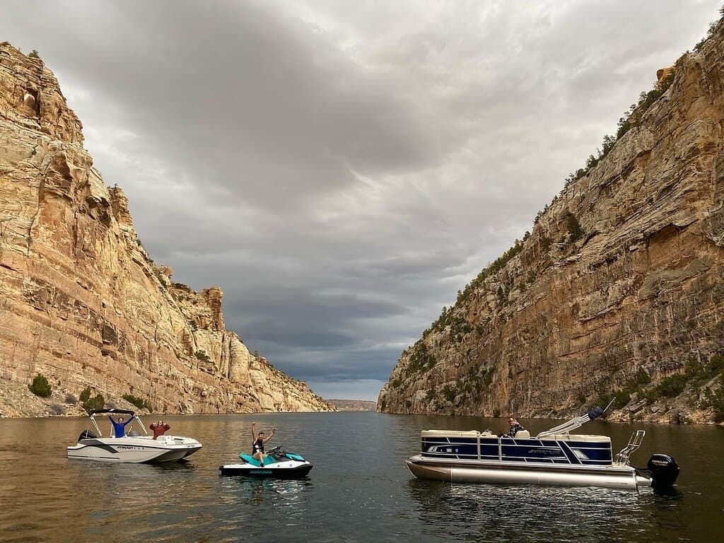 A breathtaking view of Fremont Canyon, showcasing its rugged beauty and serene waters in Alcova Resort, Casper, Wyoming.